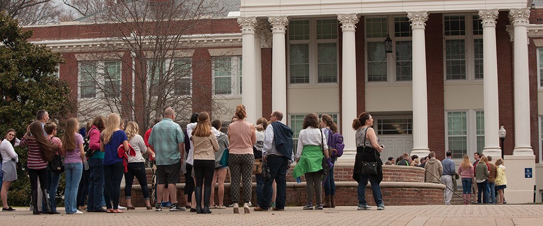 Fredericksburg, VA, USA - April 3, 2015: Families and prospective college students visit the University of Mary Washington for the campus tour